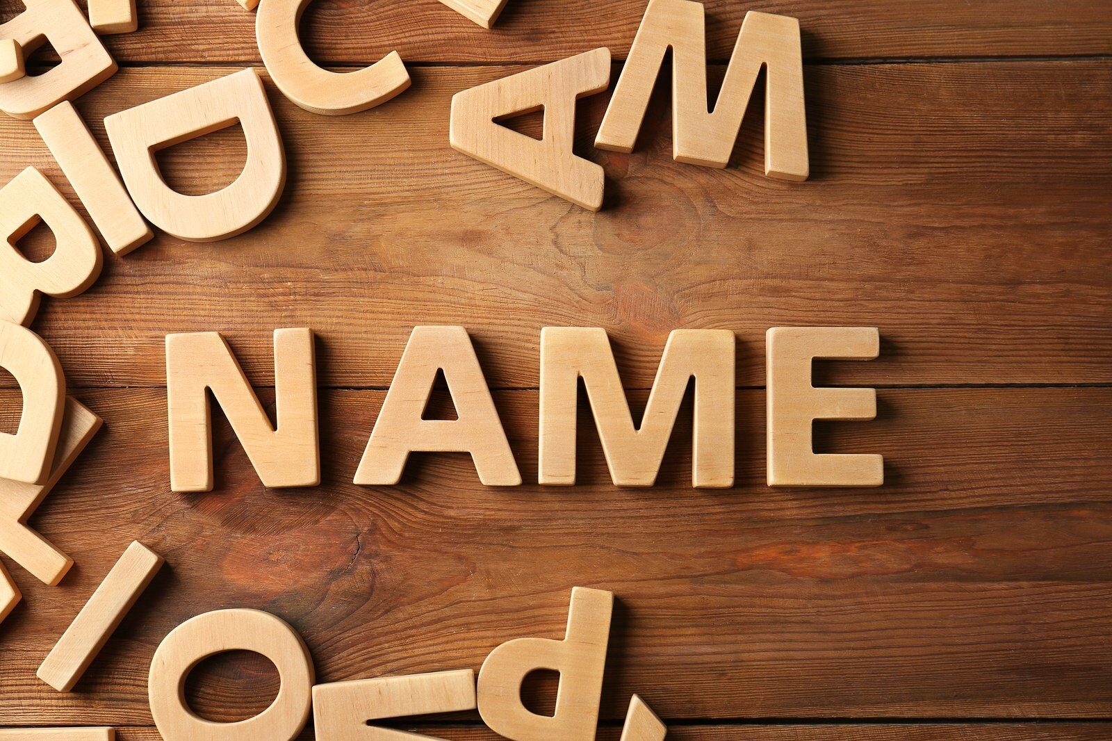 name spelled out with wooden letters